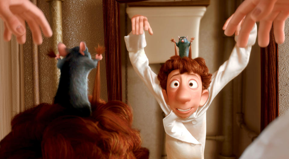 Remy tugging Alfredo's hair causing him to raise his arms