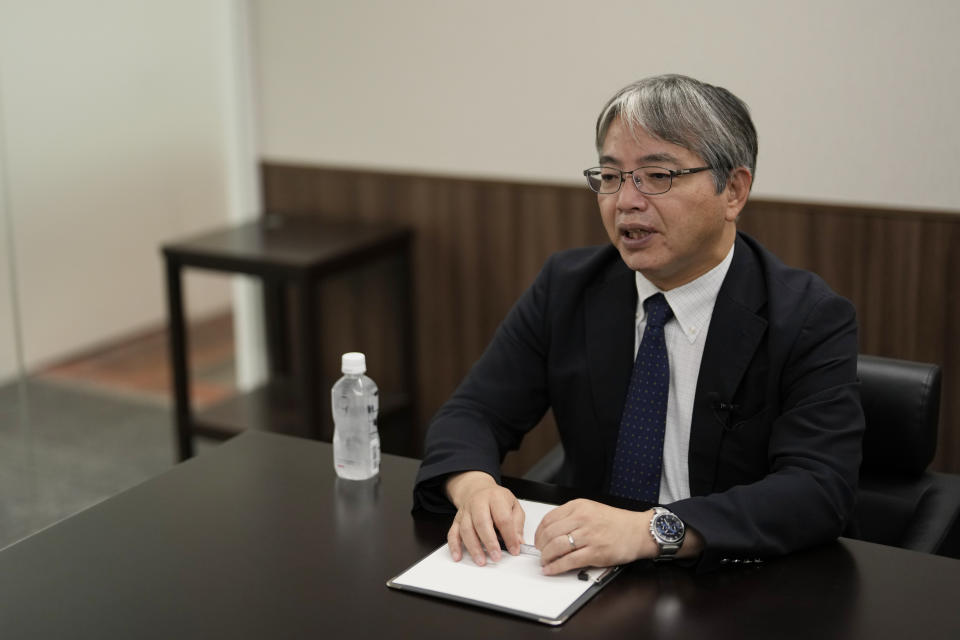 Junichi Matsumoto, an official of Tokyo Electric Power Company Holdings (TEPCO), speaks in an interview with The Associated Press at the TEPCO headquarters in Tokyo, Friday, July 28, 2023. A corporate officer in charge of treated water management for TEPCO, which operates the damaged Fukushima nuclear power plant, Matsumoto on Friday said says an upcoming release of the treated radioactive water into sea more than 12 years after the meltdown disaster marks “a milestone,” but is still an initial step of the daunting task of decades-long decommissioning process that still remain. (AP Photo/Hiro Komae)