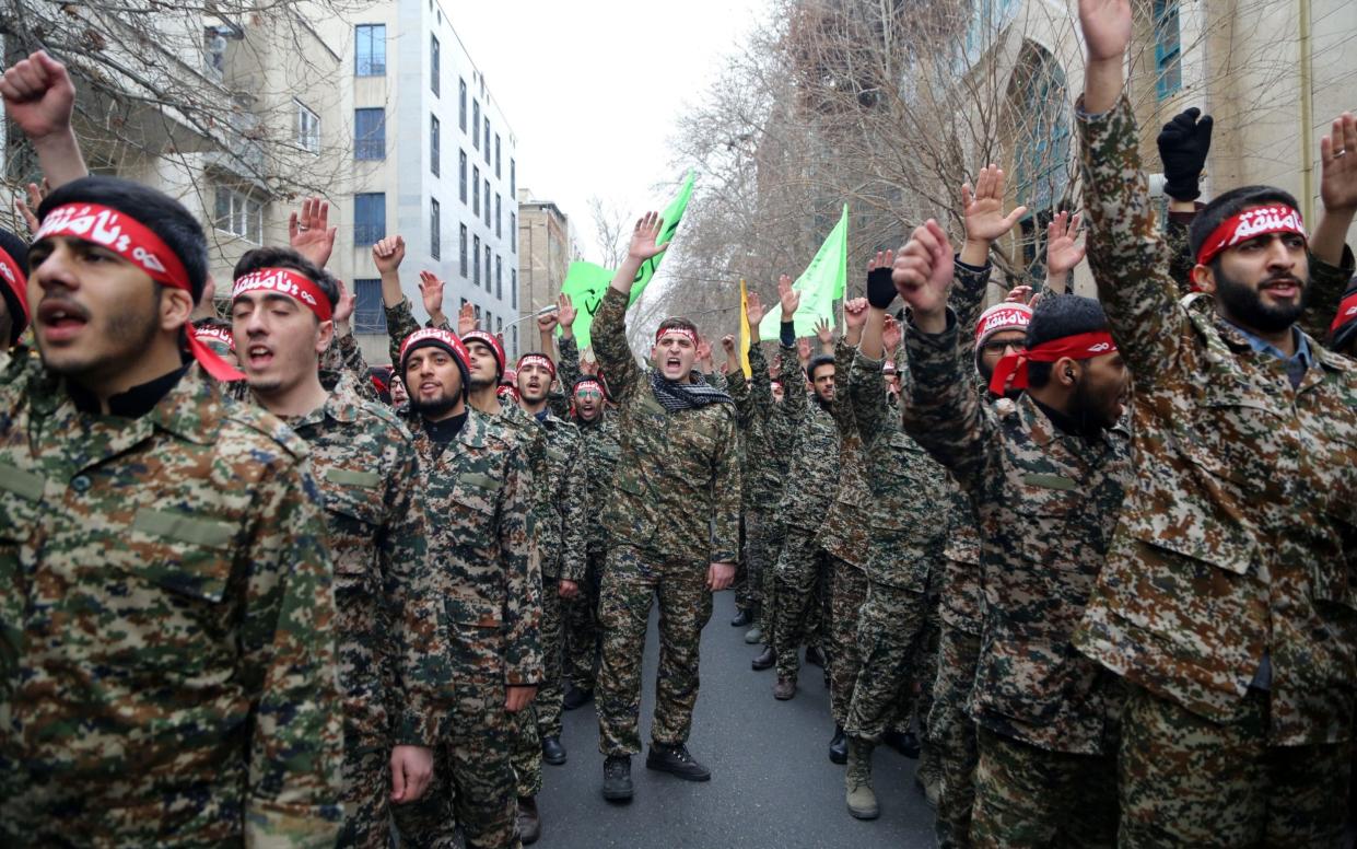 Members of the Basij militia take part in an anti-US rally to protest against the killing of Iranian Revolutionary Guards' Quds Force commander Qasem Soleimani by a US airstrike in Baghdad in Tehran in Jan 2020 - Fatemeh Bahrami/Anadolu Agency via Getty Images