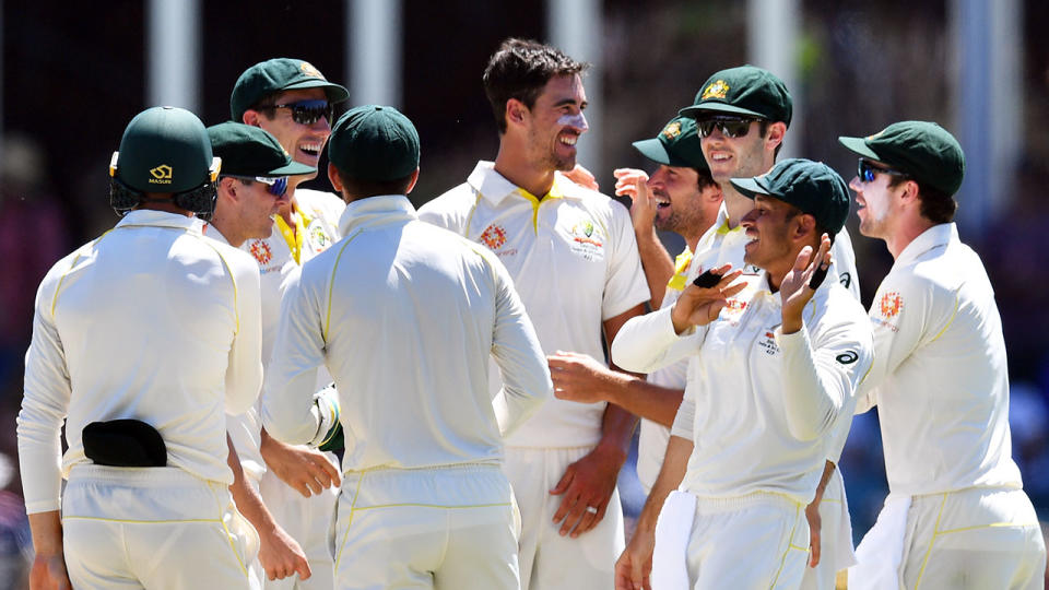 Australia's Test team celebrates during their victorious series against England.