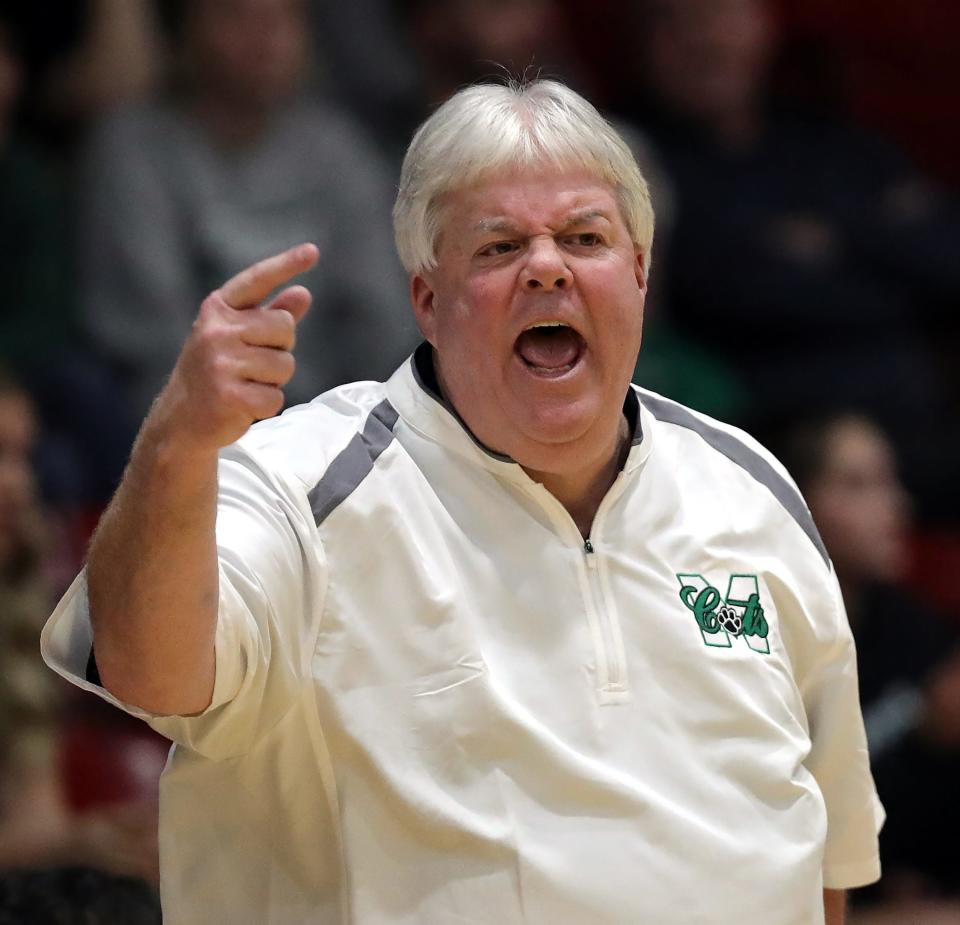 Mogadore basketball coach Russ Swartz reacts during the second half of a Division IV district semifinal at Struthers Fieldhouse, Monday, March 4, 2024.