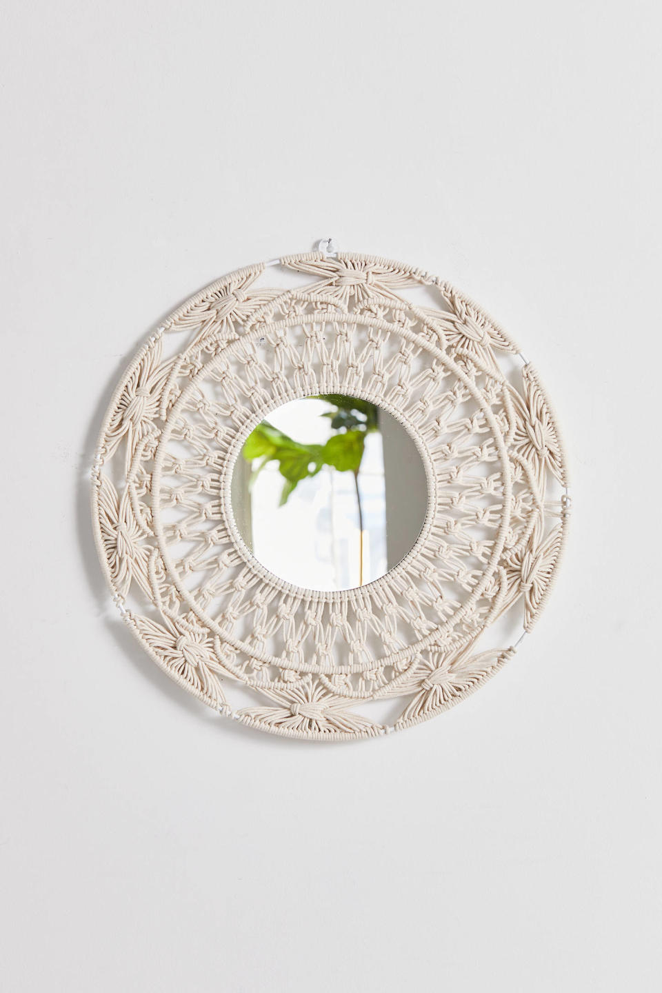 Macramé Round Wall Mirror. Image via Urban Outfitters.