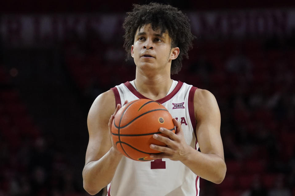 FILE - Oklahoma forward Jalen Hill (1) in the second half of an NCAA college basketball game against West Virginia on March 1, 2022, in Norman, Okla. The Sooners open the season on Nov. 7 at home against Sam Houston. (AP Photo/Sue Ogrocki, File)