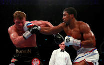 Boxing - Anthony Joshua v Alexander Povetkin - WBA Super, IBF, WBO & IBO World Heavyweight Titles - Wembley Stadium, London, Britain - September 22, 2018 Anthony Joshua in action against Alexander Povetkin Action Images via Reuters/Andrew Couldridge