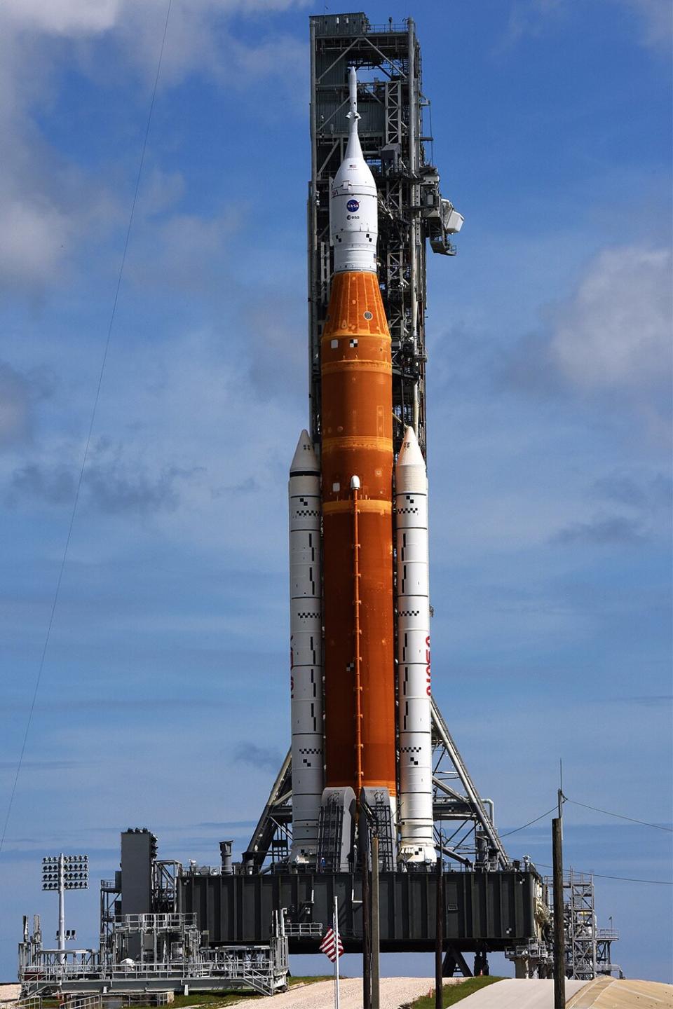 NASAs Artemis 1 rocket stands ready for launch on pad 39-B at the Kennedy Space Center on August 27, 2022, in Cape Canaveral, Florida. The rocket is being prepared for an unmanned flight around the moon on August 29, 2022.