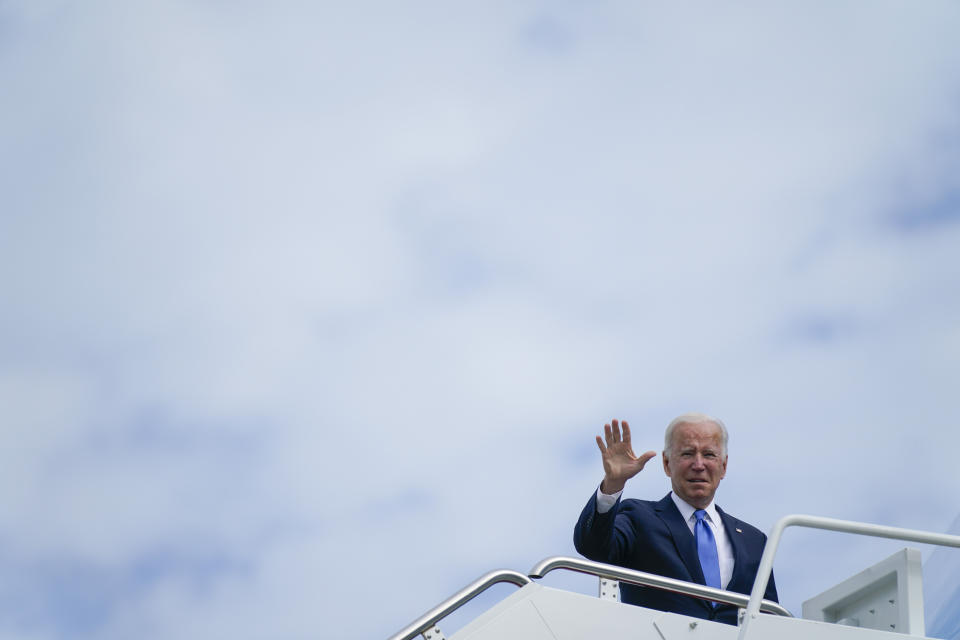 President Joe Biden waves as he boards Air Force One for a trip to Connecticut to promote his "Build Back Better" agenda, Friday, Oct. 15, 2021, in Andrews Air Force Base, Md. (AP Photo/Evan Vucci)