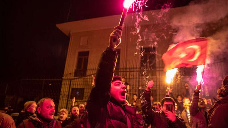 Protesters hold lit torches during the demonstration. After Rasmus Paludan, the leader of the far-right political party Hard Line in Denmark and also a Swedish citizen, burning the Holy Quran near the Turkish Embassy in Stockholm, Anatolian Youth Association (AGD) and National Youth Foundation (MGV) members and supporting citizens held a demonstration near the Swedish Consulate in Beyoglu, Istanbul.