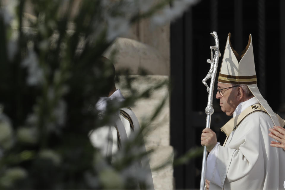 Pope Francis arrives for a canonization ceremony in St. Peter's Square at the Vatican, Sunday, Oct. 14, 2018. Pope Francis canonizes two of the most important and contested figures of the 20th-century Catholic Church, declaring Pope Paul VI and the martyred Salvadoran Archbishop Oscar Romero as models of saintliness for the faithful today. (AP Photo/Andrew Medichini)