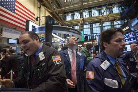 Traders work on the floor of the New York Stock Exchange March 4, 2014. REUTERS/Brendan McDermid