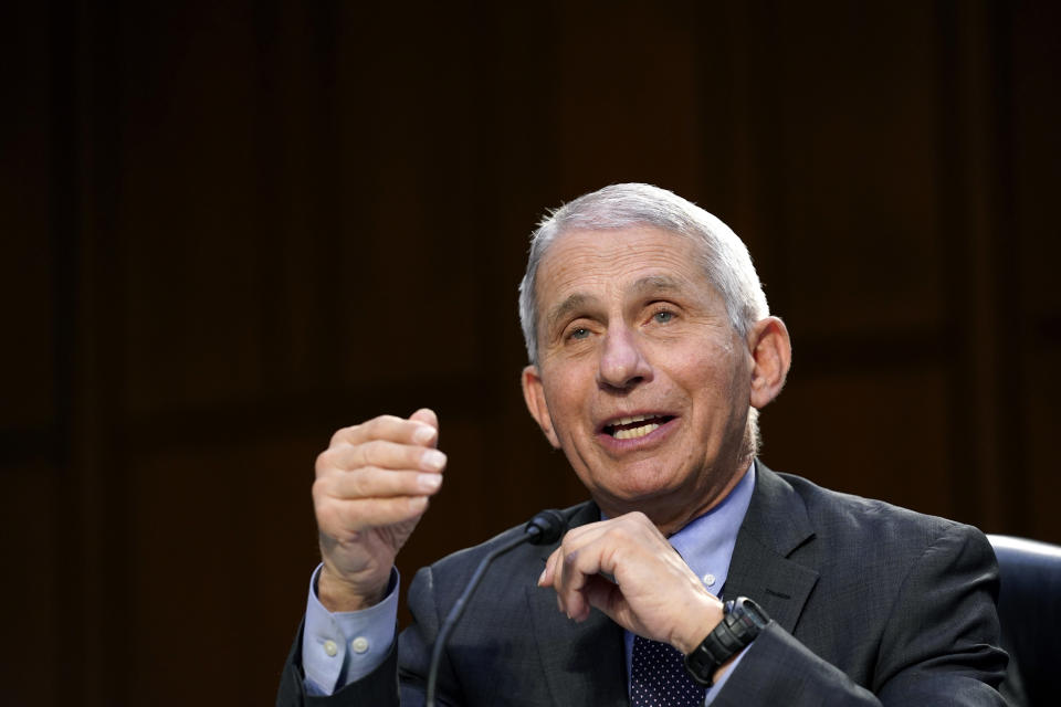 FILE - In this March 18, 2021 file photo, Dr. Anthony Fauci, director of the National Institute of Allergy and Infectious Diseases, testifies during a Senate Health, Education, Labor and Pensions Committee hearing on the federal coronavirus response on Capitol Hill in Washington. On Friday, May 28, 2021, The Associated Press reported on stories circulating online incorrectly asserting that the front page of a New York Post newspaper shows an image of Fauci under the headline, “Triggered ‘gay cancer’ epidemic in the U.S. THE MAN WHO GAVE US AIDS,” to give the false impression that a 1987 article was about him. The Post did run that headline on Oct. 6, 1987, but the actual story was about a different individual and did not mention Fauci -- nor did it include his photo. (AP Photo/Susan Walsh, Pool, File)