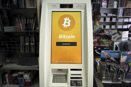 A Bitcoin ATM is seen inside a bookstore in Acharnai in northern Athens, Greece June 30, 2015. REUTERS/Dimitris Michalakis