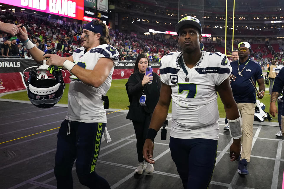 Seattle Seahawks quarterback Geno Smith (7) leaves the field after a 21-20 win over the Arizona Cardinals in an NFL football game Sunday, Jan. 7, 2024, in Glendale, Ariz. (AP Photo/Ross D. Franklin)