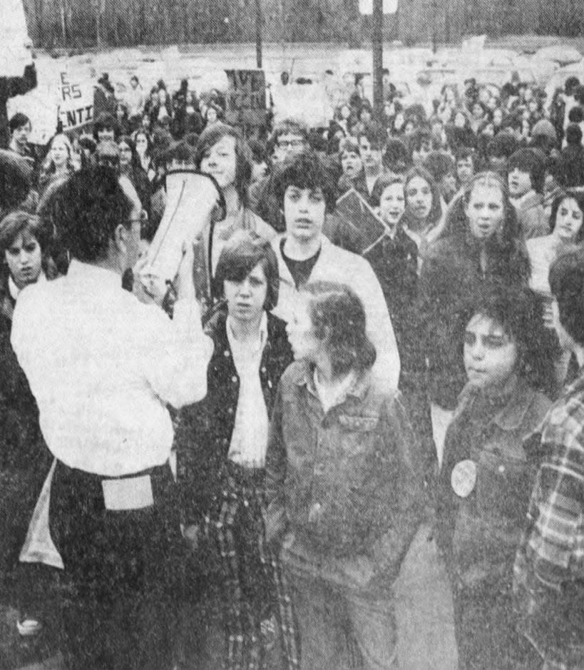Principal James Salvatore attempts to get more than 400 North Brunswick High School pupils to enter school on the morning of Friday, April 5, 1974, when they staged a demonstration in support of two teachers who were not being rehired by the school board.