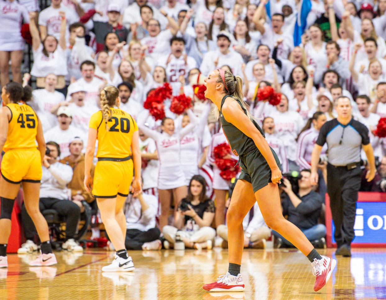 Indiana's Sydney Parrish (33) celebrates during the first half of the Indiana versus Iowa women's basketball game at Simon Skjodt Assembly Hall on Thursday, Feb. 22, 2024.