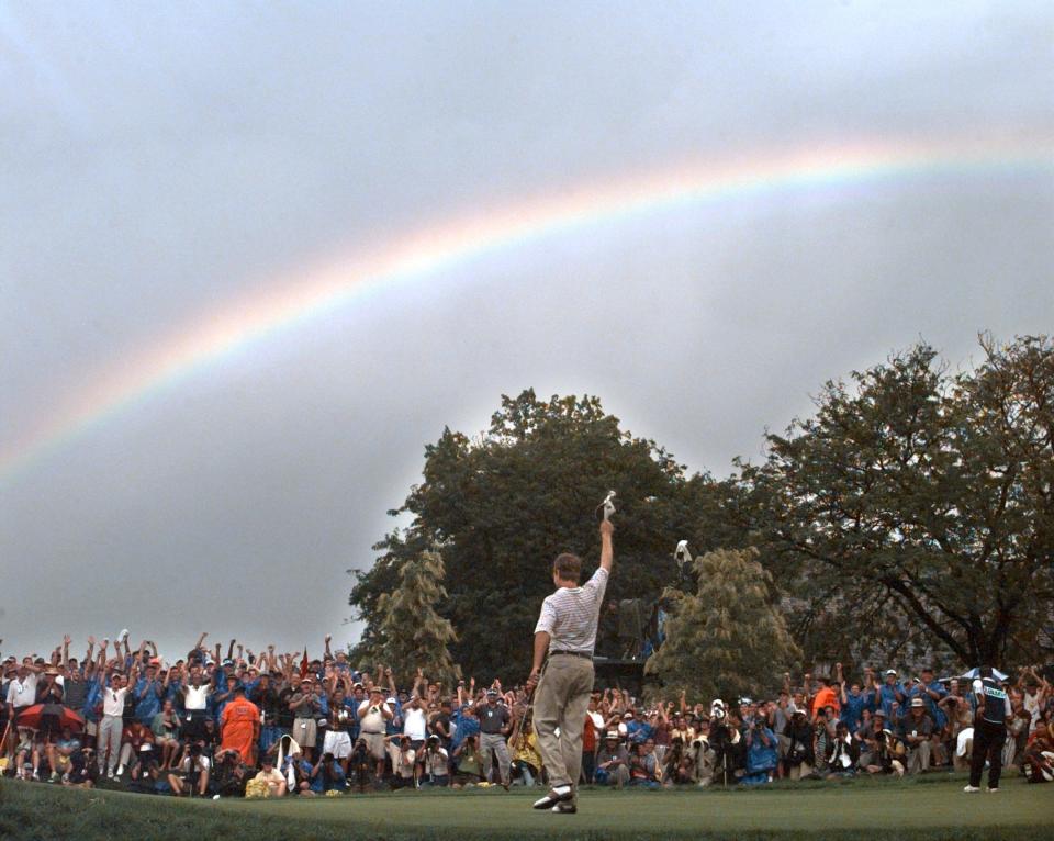 A rainbow soars above Davis Love III, of Sea Island, Ga., after he won the PGA Championship at Winged Foot Golf Club in Mamaroneck, N.Y., Sunday, August 17, 1997. Love finished the four rounds at -11. (AP Photo/Elise Amendola )