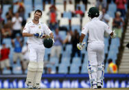 South Africa's Stephen Cook (L) celebrates his century with JP Duminy during the fourth cricket test match against England in Centurion, South Africa, January 22, 2016. REUTERS/Siphiwe Sibeko