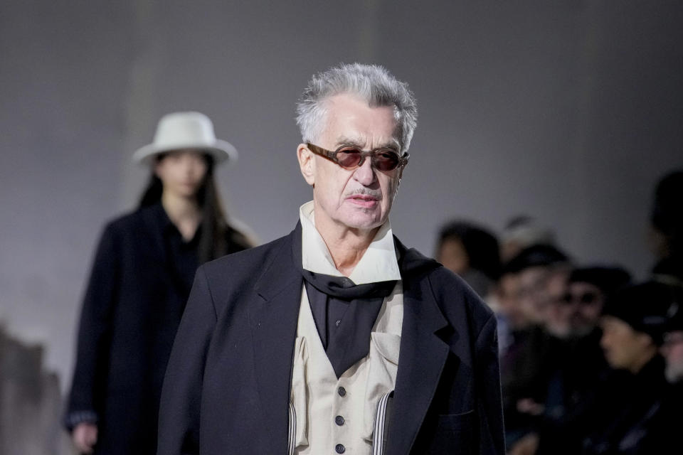 Wim Wenders wears a creation for Yohji Yamamoto as part of the Menswear ready-to-wear Fall-Winter 2024-2025 collection presented in Paris, Thursday, Jan. 18, 2024. (AP Photo/Christophe Ena)