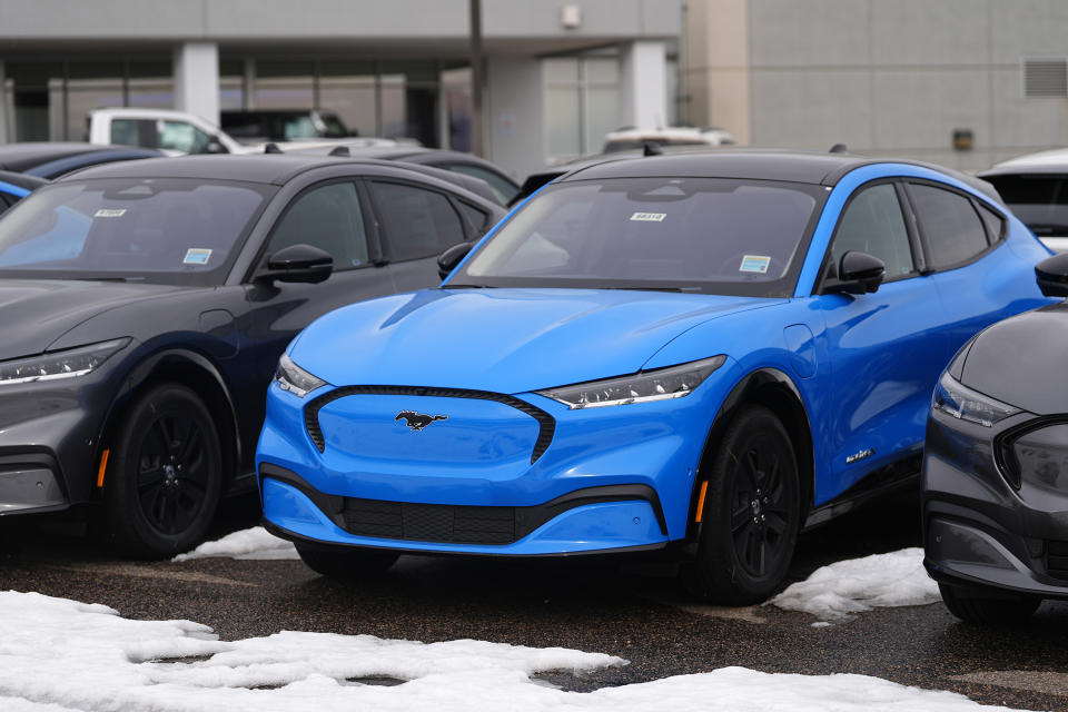 FILE - 2024 Mustang Mach-E electric vehicles are displayed at a Ford dealership Sunday, Jan. 21, 2024, in Broomfield, Colo. As he tries to secure his legacy, President Joe Biden has unleased a flurry of election-year rules on the environment and other topics, including a landmark regulation that would force coal-fired power plants to capture smokestack emissions or shut down. Beside the power plant rule, the EPA also issued separate rules targeting tailpipe emissions from cars and trucks. (AP Photo/David Zalubowski, File)