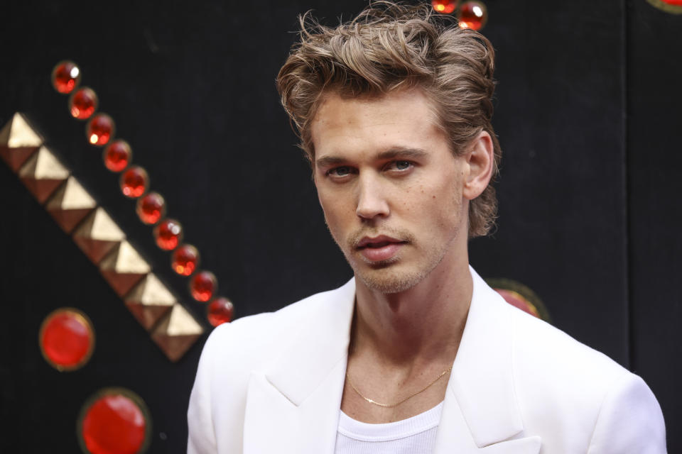 Austin Butler poses for photographers upon arrival for the premiere of the film 'Elvis' in London Tuesday, May 31, 2022. (Photo by Vianney Le Caer/Invision/AP)