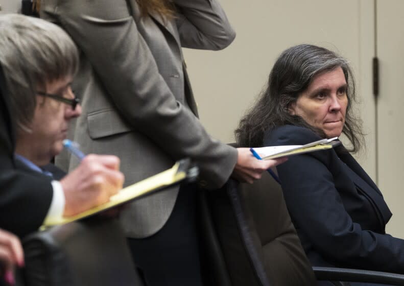 RIVERSIDE, CA - FEBRUARY 23, 2018: David Turpin, 56, and Louise Turpin,46,appear in court to set a date for a preliminary hearing and for the district attorney to announce new charges against the couple for multiple counts of torture, child abuse, abuse of dependent adults and false imprisonment at the Riverside Hall of Justice February 23, 2018 in Riverside, California. (Gina Ferazzi / Los Angeles Times)