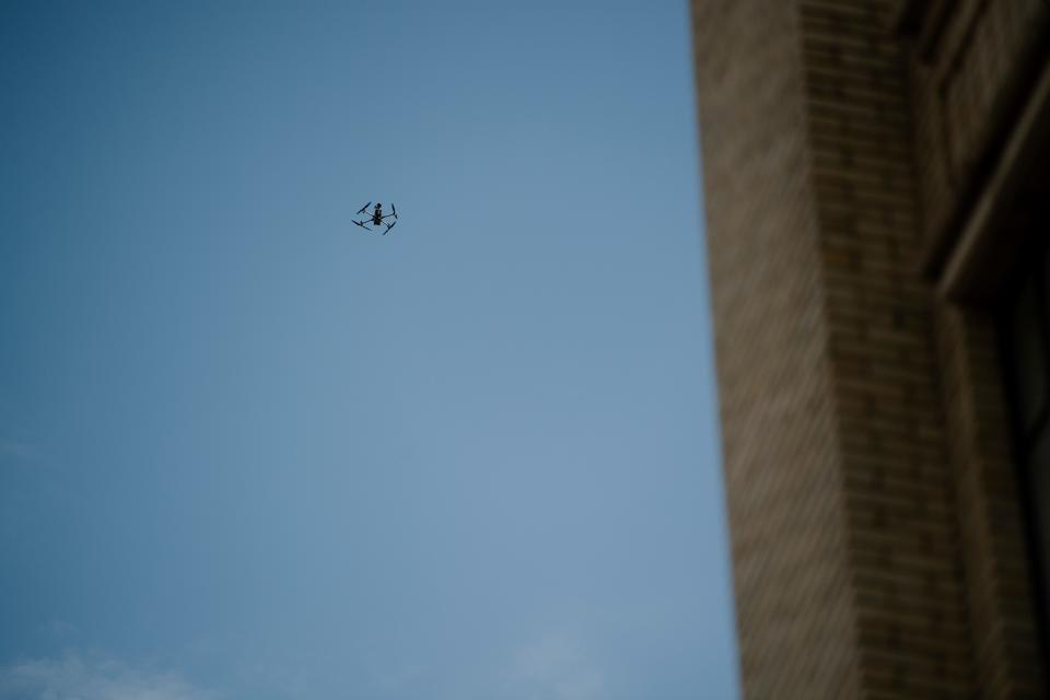 A police drone hovers near Pack Square in Asheville, November 9, 2023, before a cease-fire rally in support of Palestine.