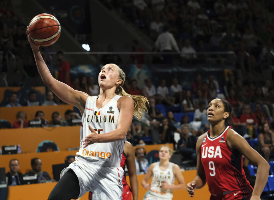 Julie Allemand of the Belgian jumps to basket against A'Ja Wilson of the United States during the Women's basketball World Cup semi final match between Belgium and the U.S.A. in Tenerife, Spain, Saturday Sept. 29, 2018. (AP Photo Andres Gutierrez)