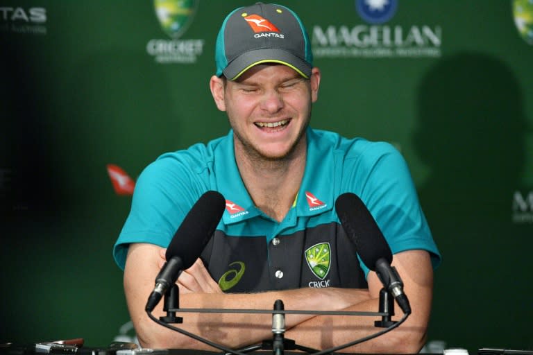 Australia's captain Steve Smith laughs during a press conference in Brisbane, on November 22, 2017, on the eve of their first Ashes Test match