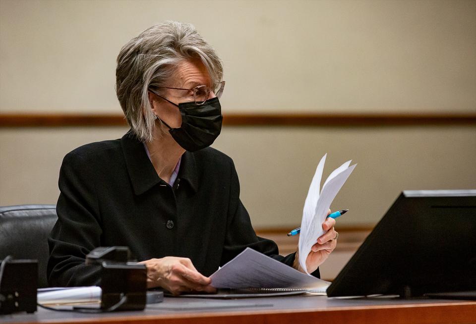 Assistant Attorney General Barbara Whaley talks to Circuit Judge Ann Bailey Smith during a pre-trial conference for former Louisville Metro Police detective Brett Hankison Friday, where Judge Smith moved the trial to Feb. 1, 2022, because of a Kentucky Supreme Court directive giving priority to trials of people being held in jail.