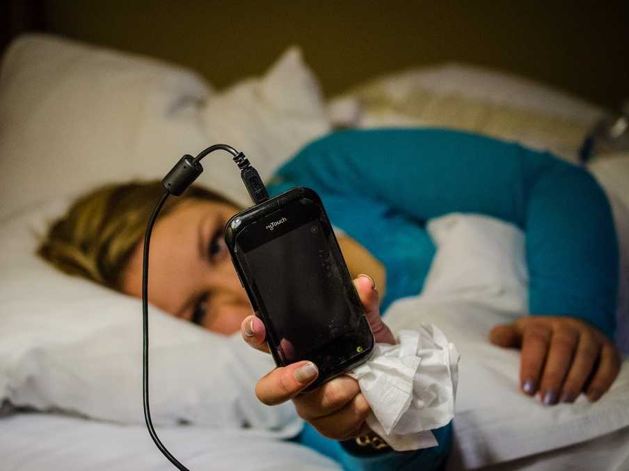 blue light smartphone bed