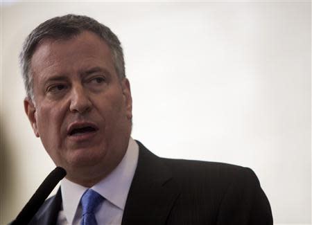 New York Mayor Bill de Blasio speaks at a news conference in the Brownsville neighborhood in the borough of Brooklyn, New York January 30, 2014. REUTERS/Eric Thayer