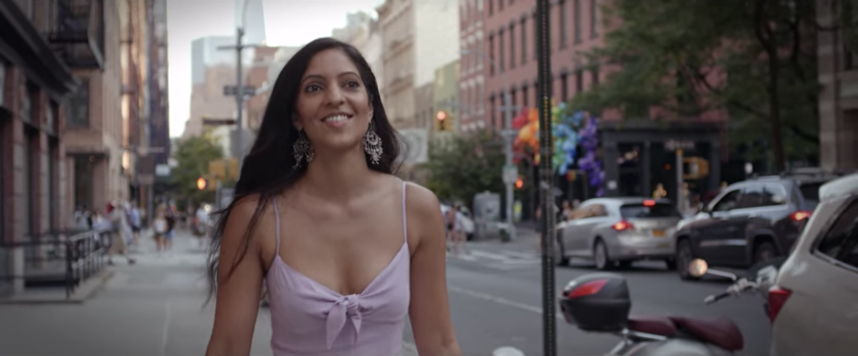 Gurki from "Dating Around" walks with a smile through New York, happily single