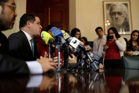 Luis Florido, lawmaker of the Venezuelan coalition of opposition parties (MUD) attends a news conference at the National Assembly building in Caracas, Venezuela, September 26, 2017. REUTERS/Ricardo Moraes