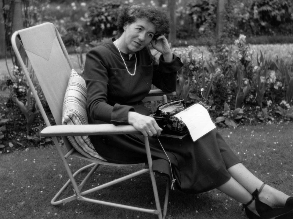 Children's writer Enid Blyton sitting in her garden in Beaconsfield, Buckinghamshire, in 1949: George Konig/Getty