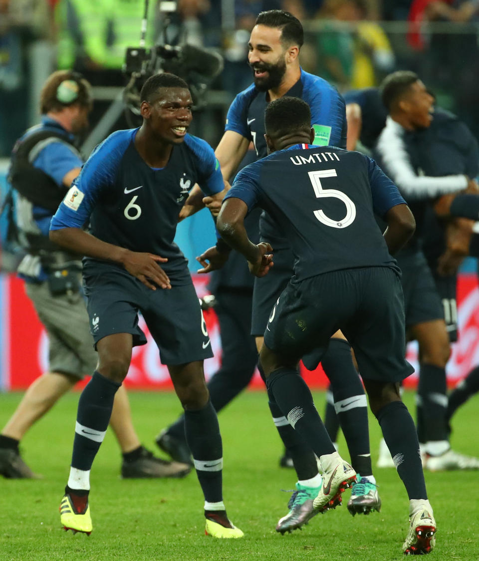 <p>Paul Pogba and Samuel Umtiti celebrate after France beat Belgium 1-0 </p>