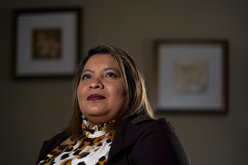 Irma Chavez poses for a photo, Tuesday, March 9, 2021, in Springdale, Ark. Chavez came to the United States from her home in El Salvador in 1994 when she was 18 and later was granted temporary protected status. (AP Photo/Jeff Roberson)