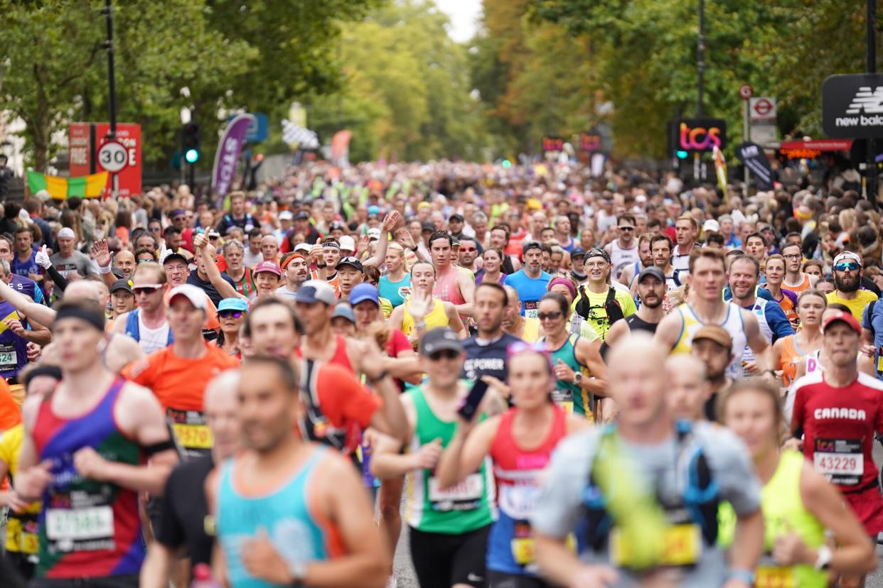 Members of the public during the TCS London Marathon. Picture date: Sunday October 2, 2022.