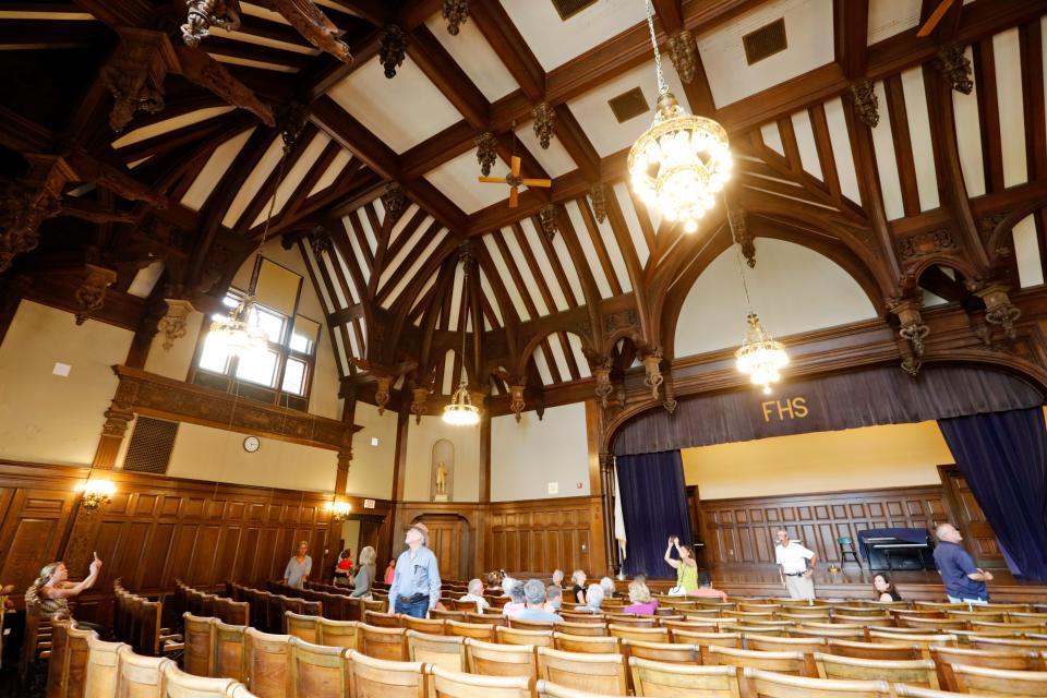 Bob Foster of the Fairhaven High School Alumni Association, speaks about the auditoriumm during a tour of the historic Fairhaven High School which was donated to the town by Henry H. Rogers in 1906.