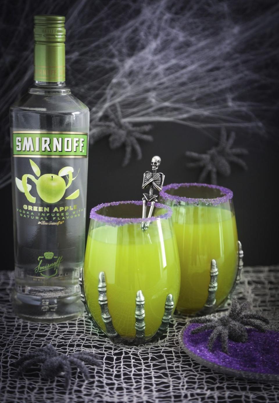 <p>drizly.com</p><p><strong>$21.99</strong></p><p>This Smirnoff cocktail kinda looks like Nickelodeon slime but, trust, it's delicious. Pour 3 oz. grape juice over ice in a glass rimmed with purple sanding sugar and mix in 5 oz. green apple vodka.</p><p><em>Recipe from Smirnoff.</em></p>