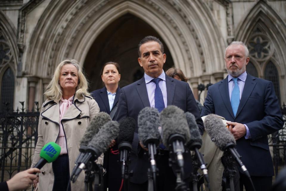 Parents of Grace O’Malley-Kumar, Dr Sanjoy Kumar (centre) and Dr Sinead O’Malley (left) outside the Royal Courts of Justice (Yui Mok/PA Wire)