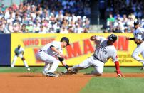 Carl Crawford #13 of the Boston Red Sox steals second base past the glove of Jayson Nix #17 of the New York Yankees in the first inning at Yankee Stadium on August 18, 2012 in the Bronx borough of New York City. (Photo by Jason Szenes/Getty Images)