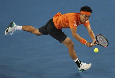 Japan's Kei Nishikori hits a shot during his third round match against Spain's Guillermo Garcia-Lopez at the Australian Open tennis tournament at Melbourne Park, Australia, January 22, 2016. REUTERS/John French