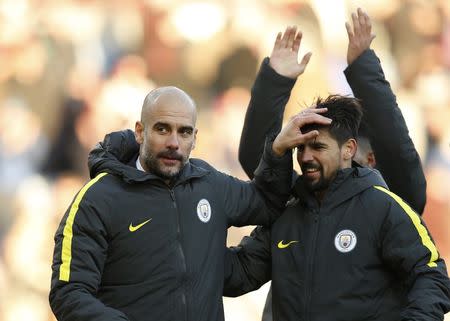 City manager Pep Guardiola and Manchester City's Nolito after the match. Burnley v Manchester City - Premier League - Turf Moor - 26/11/16 Manchester. Reuters / Andrew Yates Livepic