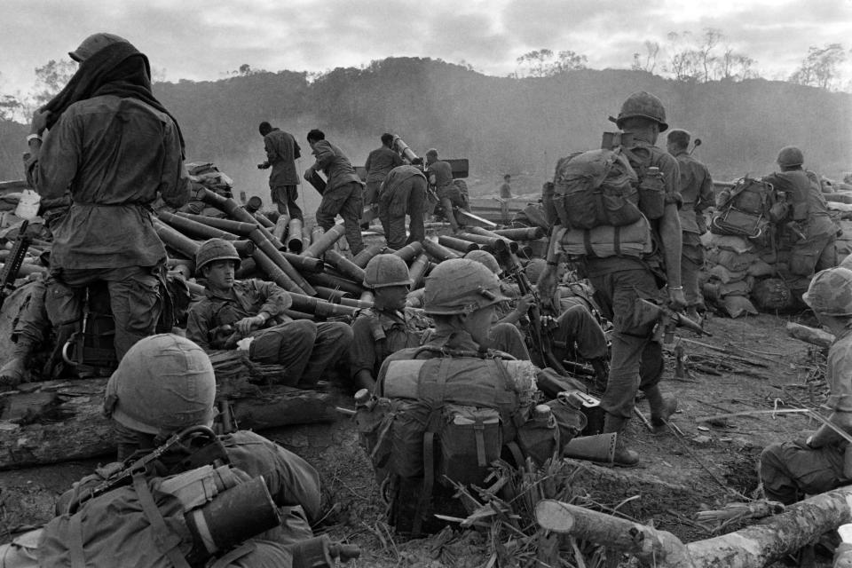 U.S. soldiers launch rockets Nov. 21, 1967, during the battle of Dak To in Vietnam. It was during this, one of the bloodiest battles of the Vietnam War, that Peter Mathews and his unit began searching a cache of supplies for North Vietnamese intelligence.
