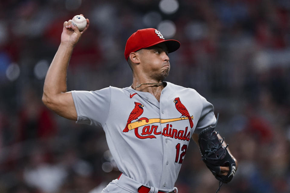 St. Louis Cardinals relief pitcher Jordan Hicks (12) works during the sixth inning of the team's baseball game against the Atlanta Braves on Thursday, July 7, 2022, in Atlanta. (AP Photo/John Bazemore)