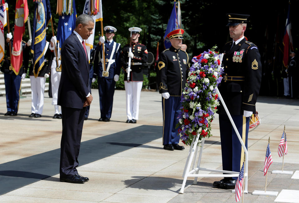 <p>President Obama lays a wreath at the Tomb of the Unknown Soldier during the Memorial Day observance at Arlington National Cemetery in Arlington, Va., on May 30, 2016. (Yuri Gripas/Reuters) </p>