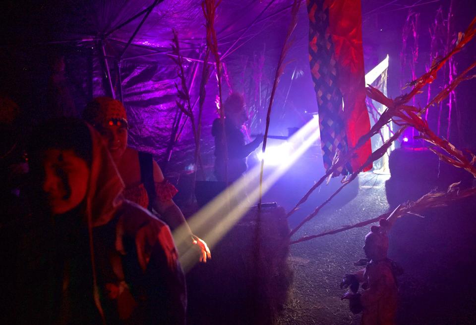 People make their way through the haunted house at the Tom Green County Sheriff's Office Trunk or Treat event Thursday, Oct. 31, 2019.