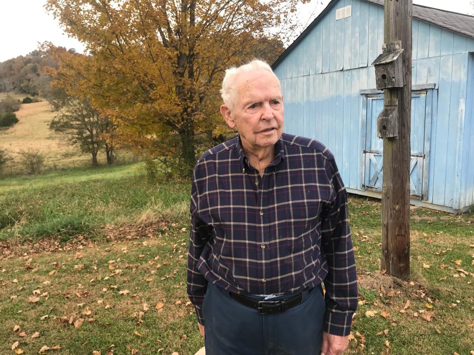 Cecil Whiteside, 99, a World War II veteran, enjoys farming, woodworking and collecting antiques, stored in a blue shed he built called "Cecil's Museum."