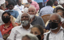 Elderly Indians awaits their turn to get vaccinated for COVID-19 at a vaccination center in Mumbai, India, Monday, March 1, 2021. India is expanding its COVID-19 vaccination drive beyond health care and front-line workers, offering the shots to older people and those with medical conditions that put them at risk. As of Monday, those eligible to be vaccinated include people over 60, as well as those over 45 who have ailments such as heart disease or diabetes that make them vulnerable to the coronavirus. (AP Photo/Rafiq Maqbool)