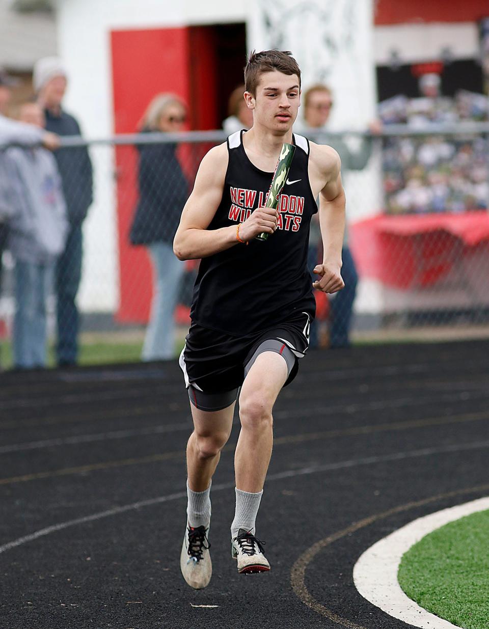 New London's Wyatt Harrison competes in the 4x800 meter relay during the Forest Pruner Track Invitational at Crestview High School on Friday, April 22, 2022. TOM E. PUSKAR/TIMES-GAZETTE.COM