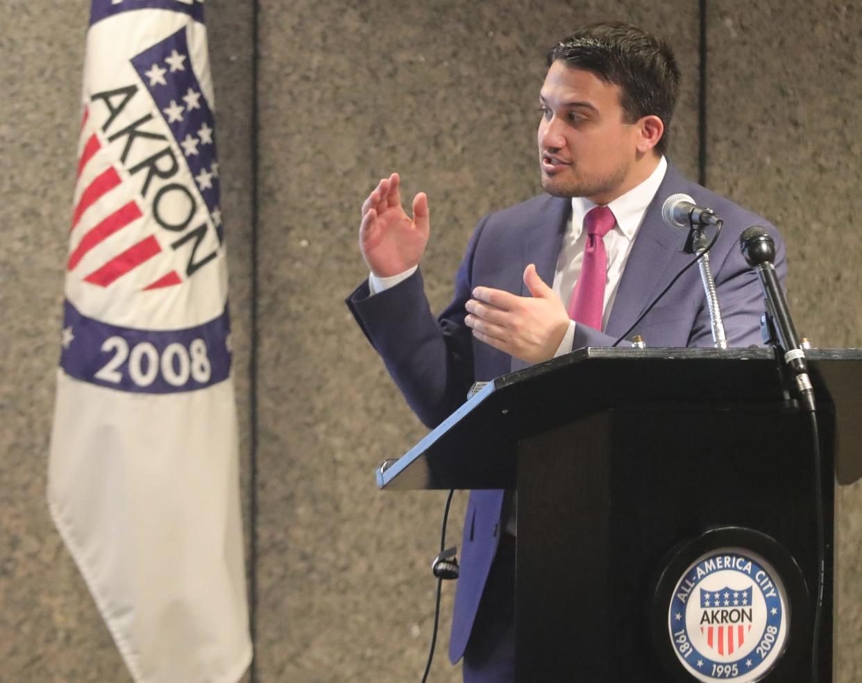 Akron Mayor Shammas Malik speaks Wednesday during a news conference at the Ocasek Building auditorium.